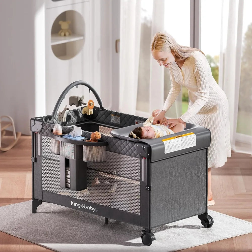 4 In 1 Baby Bassinet Pack and Play Bedside Crib Sleeper with Bottom Storage and Toy Bar for Newborns and Toddlers