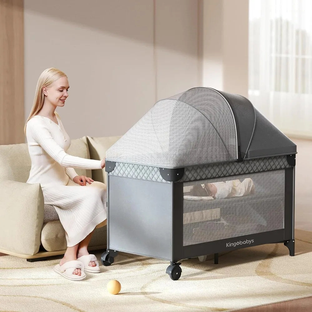 4 In 1 Baby Bassinet Pack and Play Bedside Crib Sleeper with Bottom Storage and Toy Bar for Newborns and Toddlers